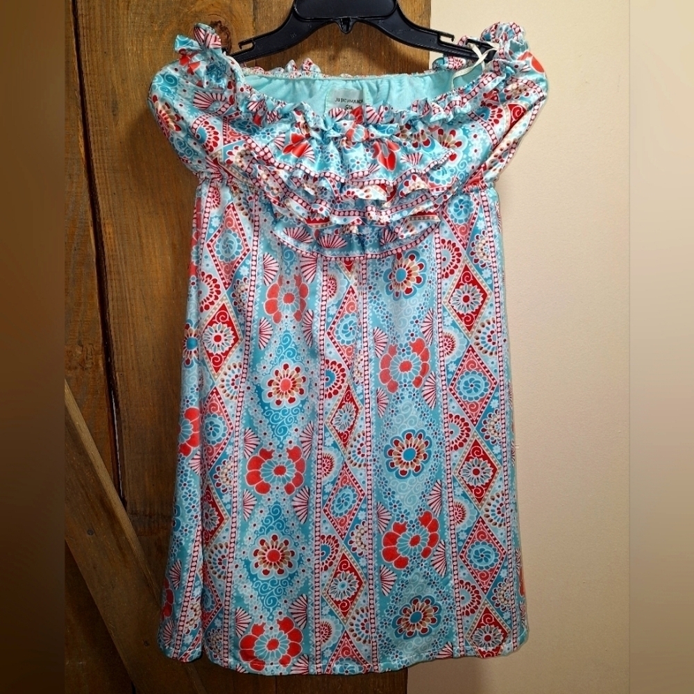 A Judith March tube top mini dress in a boho geometric pattern in a size large.
